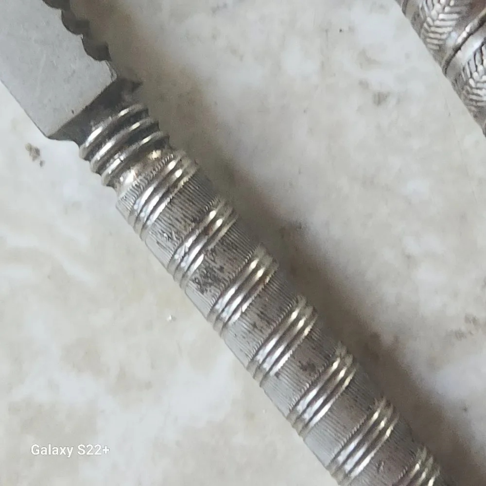 Silver metal Vintage Embossed Nutcracker & Six Picks set